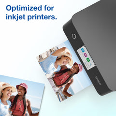 Epson paper next to ruler illustrating 8.5 by 11 inch size and heavyweight feel
