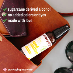 everyone bottle held in hand demonstrating compact travel size