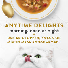 Fancy Feast pouch in hand demonstrating 1.4 oz single-serve convenience