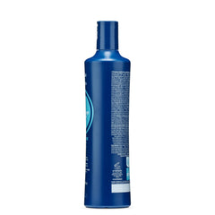 Fanola Wonder Blue pouring texture from bottle, demonstrates easy application and coverage