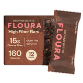 Floura front pack view showing brownie batter bar and branding, ready to grab for travel