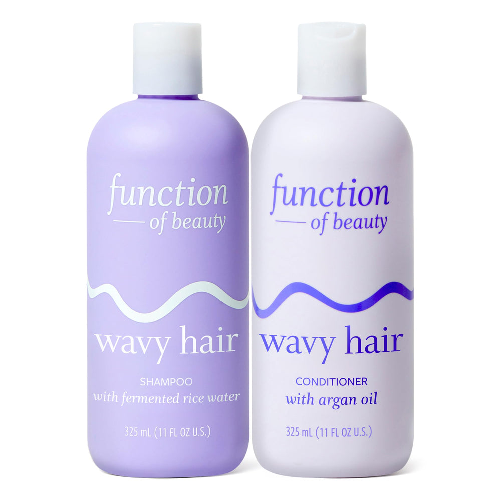 Function of Beauty front packaging of wavy shampoo and conditioner, shows cohesive set and benefits