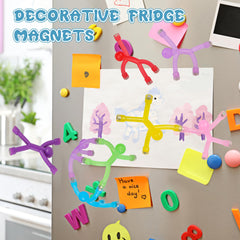 GBYMIUY magnets arranged on a fridge holding photos for easy display