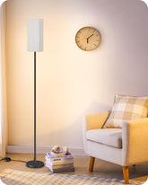 GOEBLESON lamp front view in living room highlighting compact footprint and ambient glow