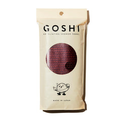 GOSHI red front view showing towel shape and secure grip for full-body reach