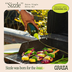 Graza Sizzle being poured into a hot pan for searing, demonstrating heat use