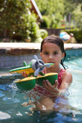 Green Toys seaplane propeller close-up demonstrating spinning motion for engaging sensory play