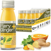 Greenhouse Juice Co. front packaging showing 12 glass wellness shot bottles, convenient travel size