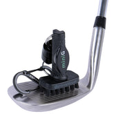 Grooveit MiniG front view showing compact brush and clip for quick access