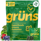 Grüns front packaging showing individual gummy packets and brand benefit
