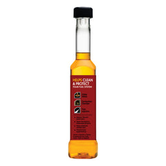 Gumout bottle close-up label showing instructions and mileage focus