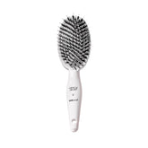 HAIRtamin Miracle Brush front view showing sleek paddle design and benefits