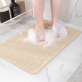 Hargiis beige mat front view showing size and clean design for safer bathing