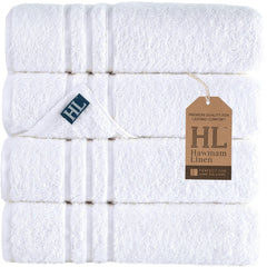 Hawmam Linen front stack of four white towels showing neat fold and plush look for everyday comfort