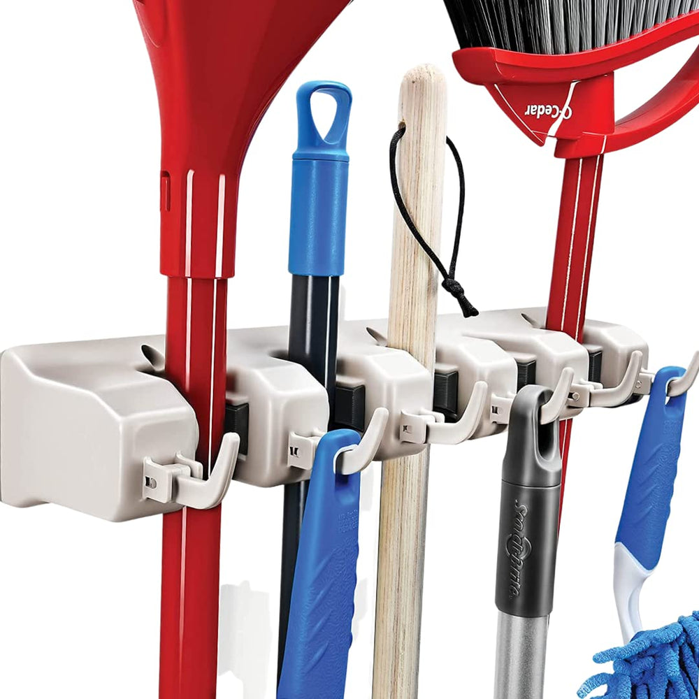 HOME IT front view of mounted broom and mop holder showing neat storage benefit