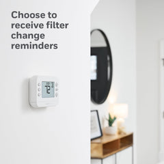 Honeywell Home installed on wall to demonstrate size and room scale context