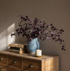 HyeFlora stems arranged in a tall vase creating a ready-made centerpiece