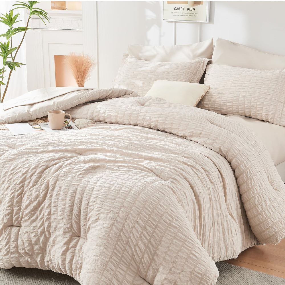 HYMOKEGE beige comforter front view showing neutral design and layered bedding benefits