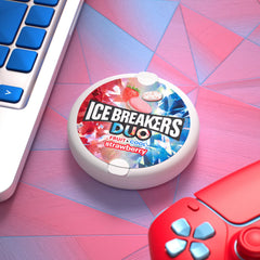 Ice Breakers Duo tin held in hand demonstrating pocketable size and convenience