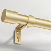 IFELS front view of gold rod showing full length and finials, adds modern style