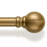 Immiehh front view of warm gold curtain rod showing polished finish and packaging benefit