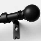 Immiehh front view of black curtain rod showing clean modern profile and durable finish