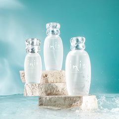 Hand spraying Inis cologne showing fine mist and quick-refresh benefit