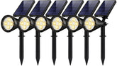 InnoGear front view of six solar spotlights showing warm white beams and layout
