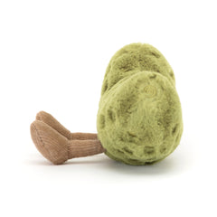 Jellycat pickle in crib setting adding playful charm to nursery decor