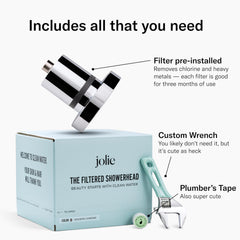 Jolie showerhead in use spraying high-pressure water for better rinsing
