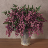 Juxdp front packaging showing six dusty plum stems for easy styling