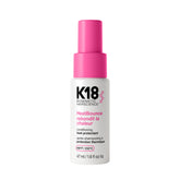 K18 HeatBounce front bottle showing label and spray nozzle for easy application