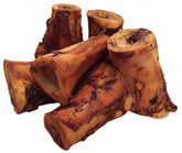 K9 Connoisseur front packaging showing beef marrow bone and clear ingredient benefit
