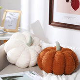 Kajaia front view of white and brown pumpkin pillows adds cozy fall style