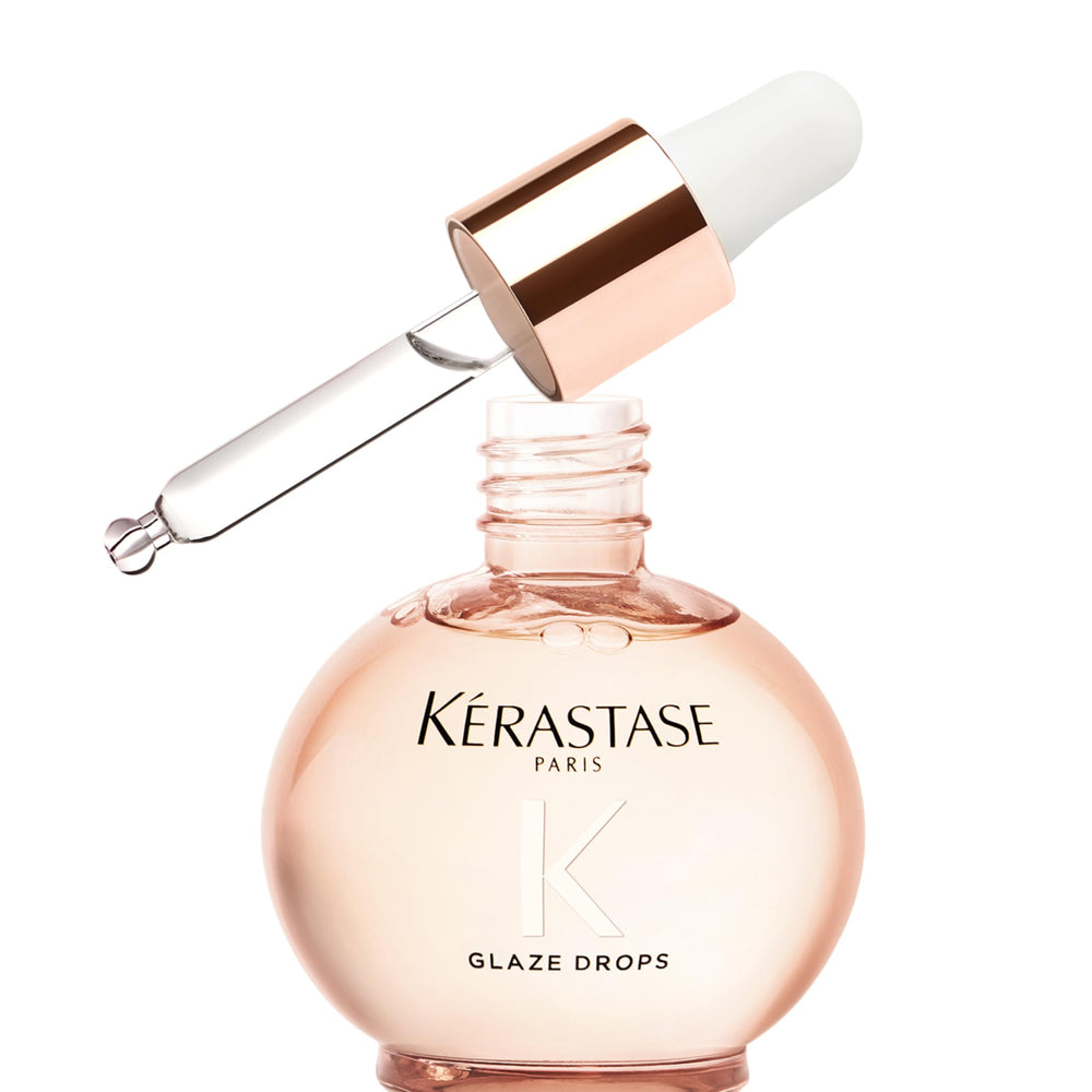 KÉRASTASE bottle front packaging showing premium shine oil benefit