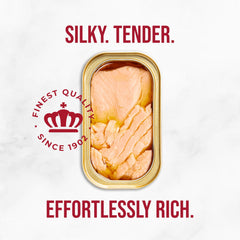 King Oscar salmon glistening in olive oil showing moist flavor benefit