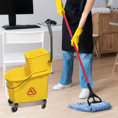 L Luke Supply mop head absorbing liquid to demonstrate strong water uptake and retention