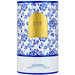 Lattafa Petra on a dressing table styled to evoke Mediterranean golden-hour warmth
