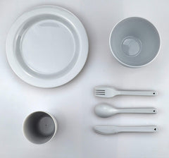 Layron bowls and cups arranged to show stackability and space-saving benefit