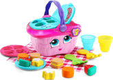LeapFrog picnic basket front view showing pink lid and handle, inviting interactive play