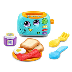 LeapFrog Yum-2-3 Toaster nine play pieces arranged to show included bread, egg and utensils for role-play