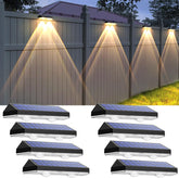 LIANGLOME front view of 8-pack fence lights showing compact black design and mounting hardware, durable convenience