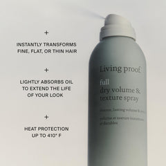 Living Proof texture spray held in hand illustrating lightweight control and grip