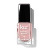 LONDONTOWN bottle front view showing dusty rose tint and benefit of natural finish