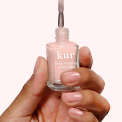 LONDONTOWN kur bottle label closeup highlighting ingredients and talc-free benefit