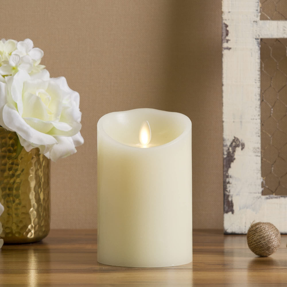 Luminara front view of ivory pillar candle showing realistic wax finish and ambiance benefit