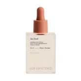 + Lux Unfiltered front packaging shows N°12 bottle and clear branding, highlighting product trust