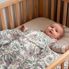 LYRICHOM BABY blanket draped over stroller offering shade and airflow on outings