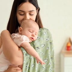 LYRICHOM BABY blanket wrapped around newborn demonstrating secure swaddling comfort