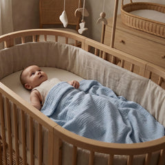 LYRICHOM BABY folded blanket draped on stroller for sun protection